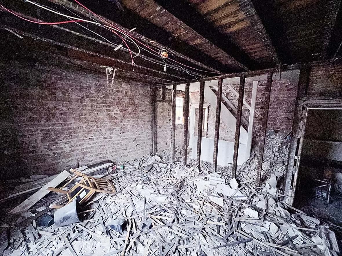 Rip-out · interior to bare brick