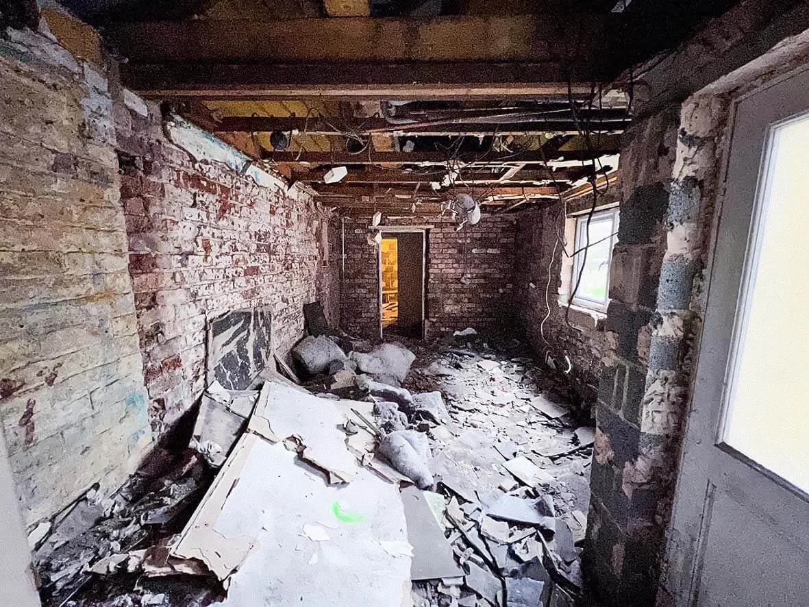 Rip-out · exposed brickwork