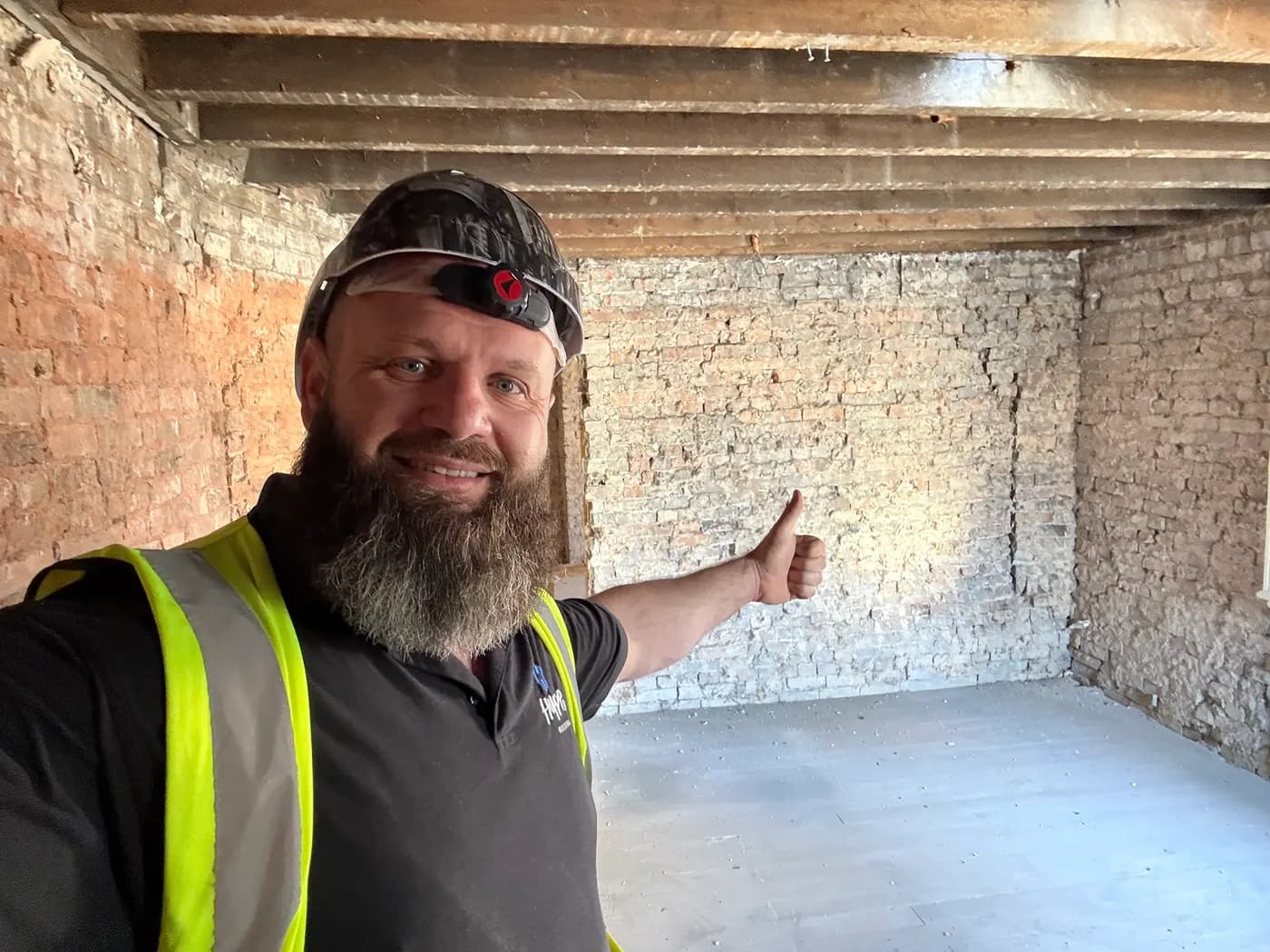 Mid-build · retained brick