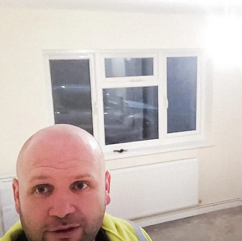 New uPVC window installed where the fire-damaged frame had been