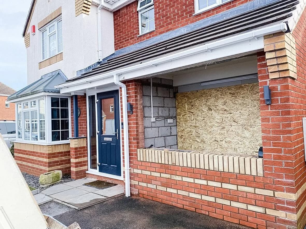 Mid-build · original door opening bricked up