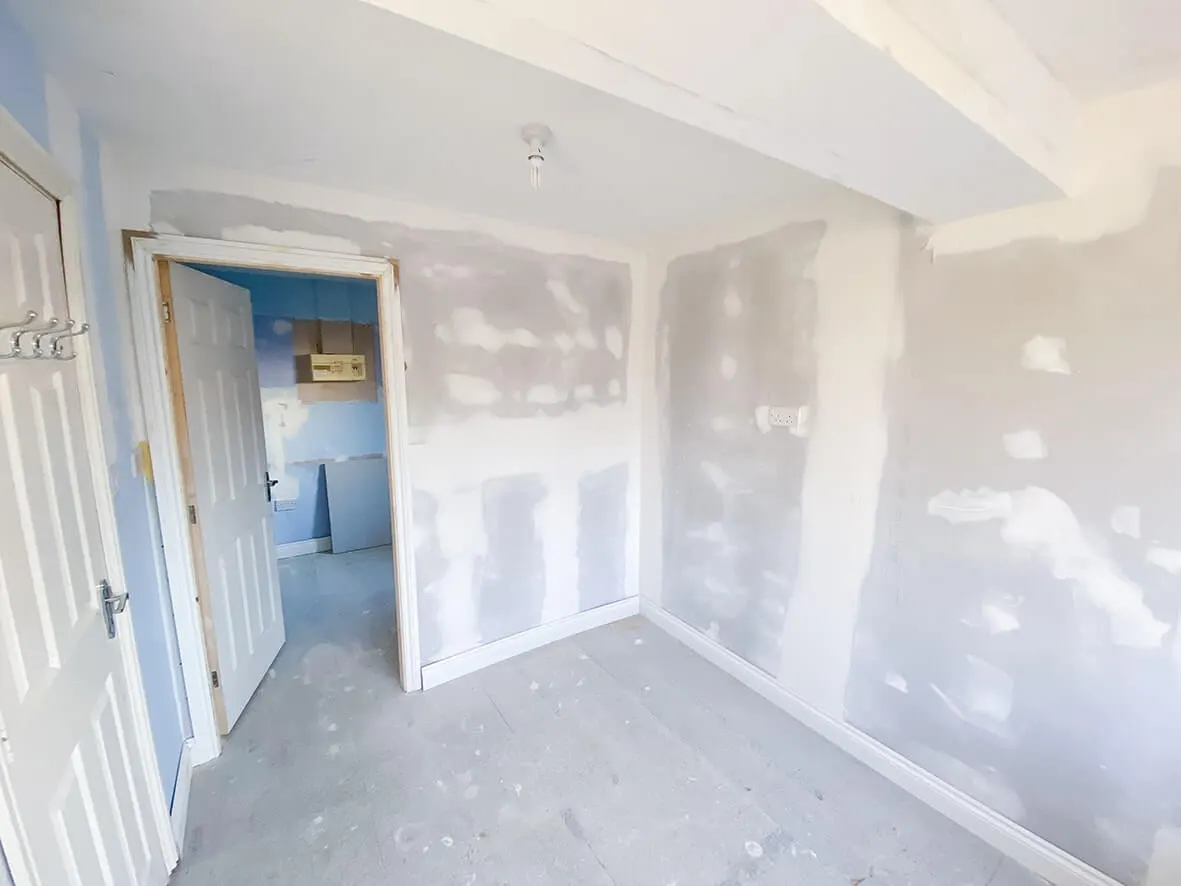 Mid-build · insulated plasterboard going up