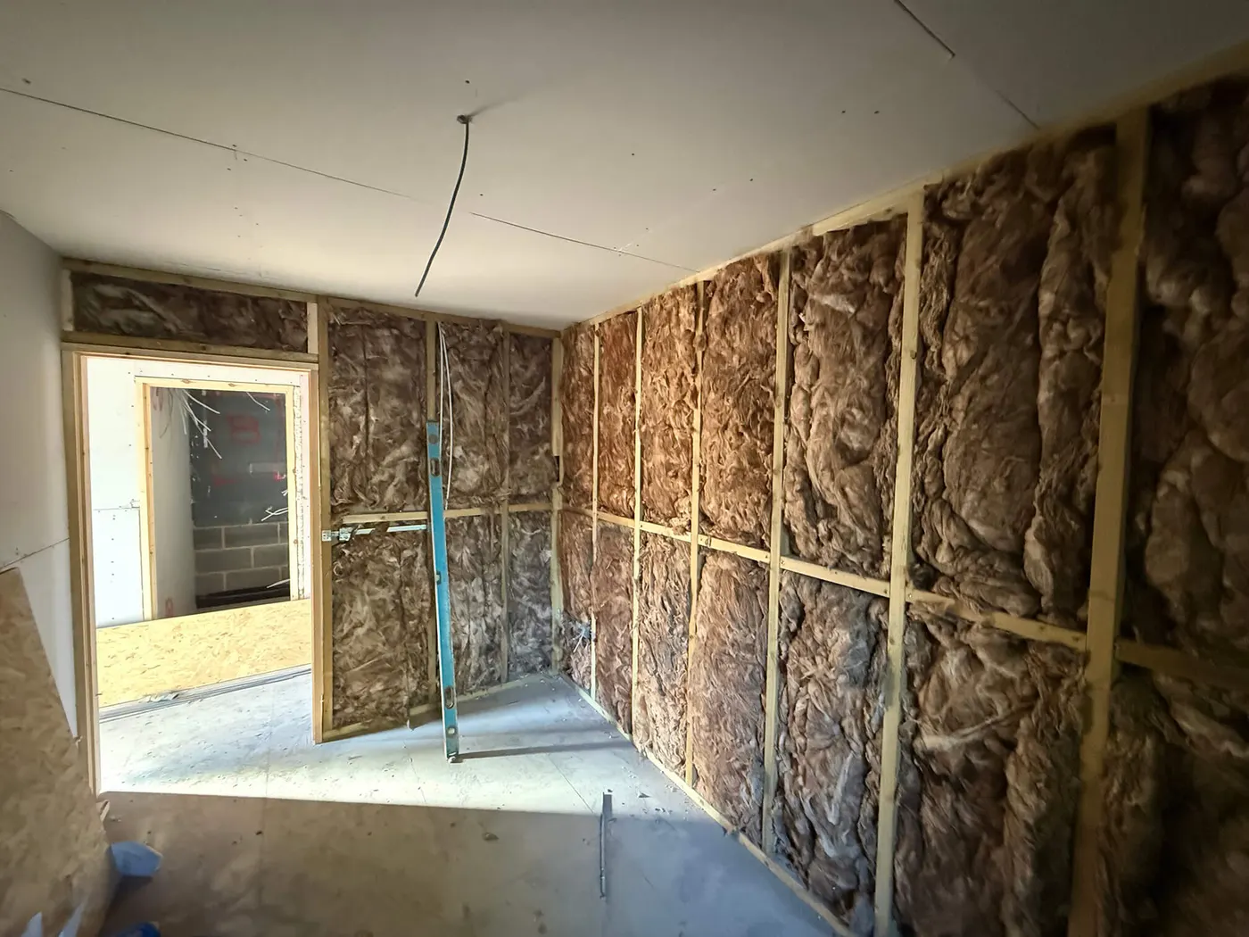 Mid-build · stud partitions up