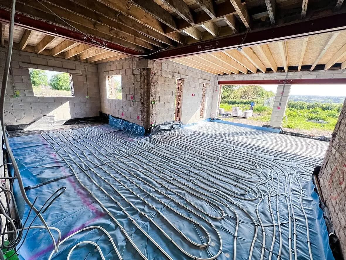 UFH subfloor · concrete slab below insulation
