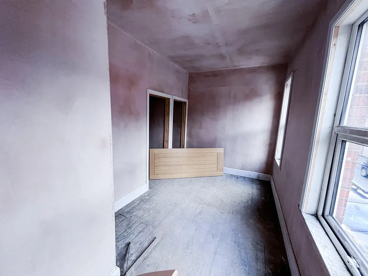 Mid-build · bedroom partition adjusted