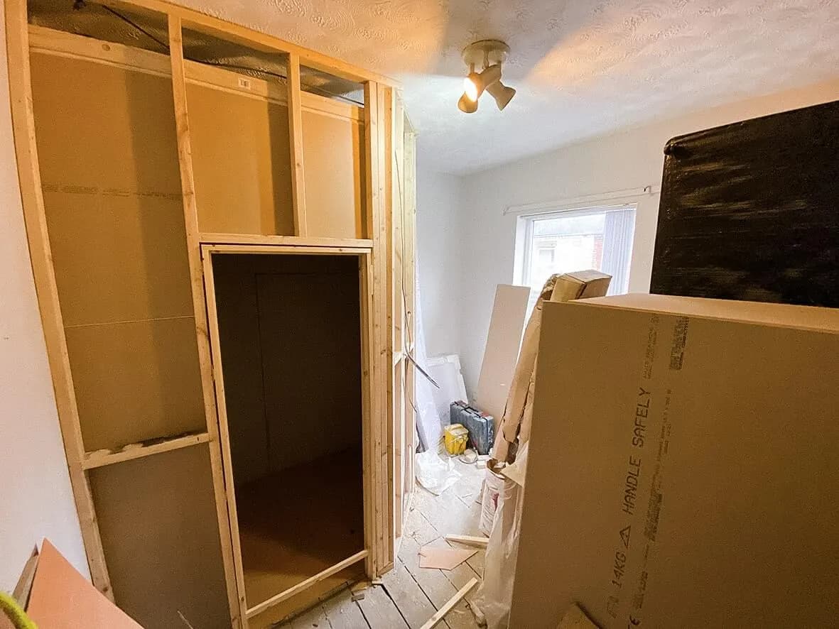 Mid-build · former kitchen becoming downstairs bedroom