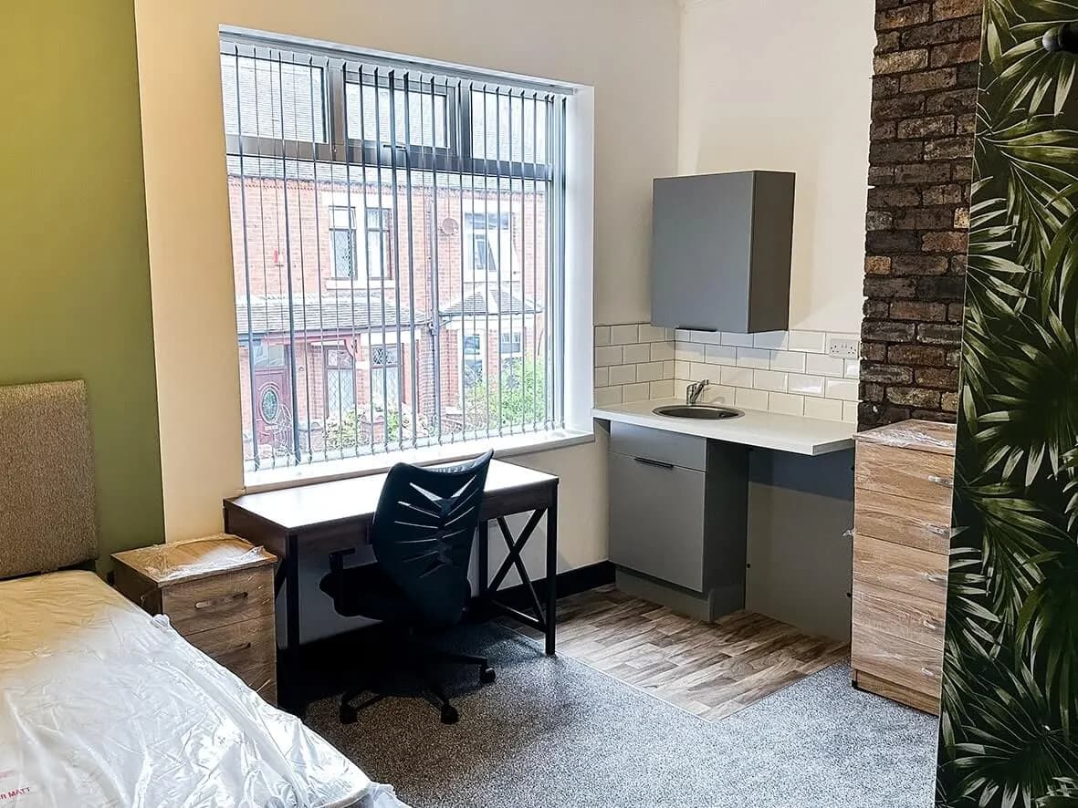 Complete · communal lounge with patio doors