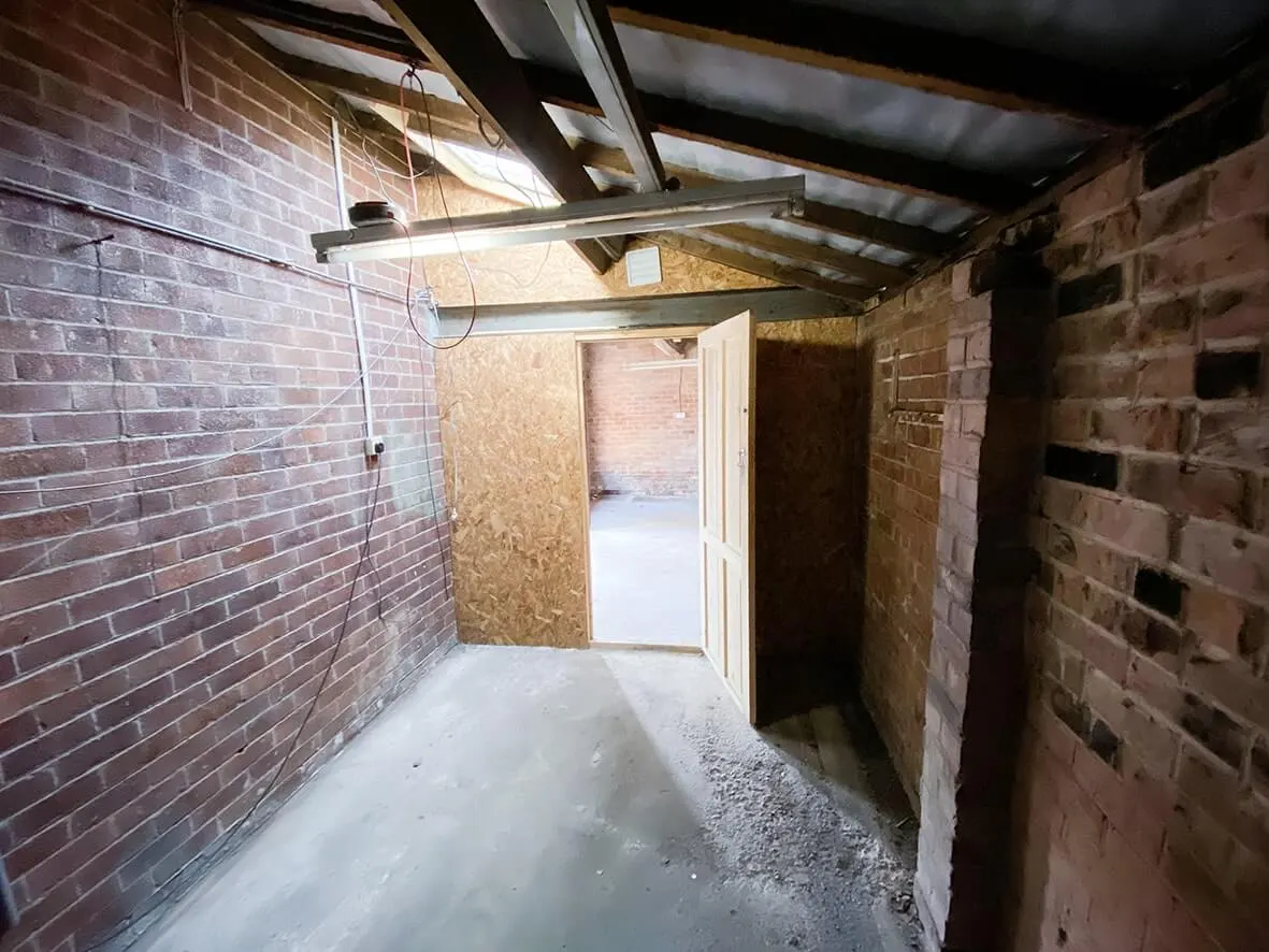 Mid-build · supporting walls removed
