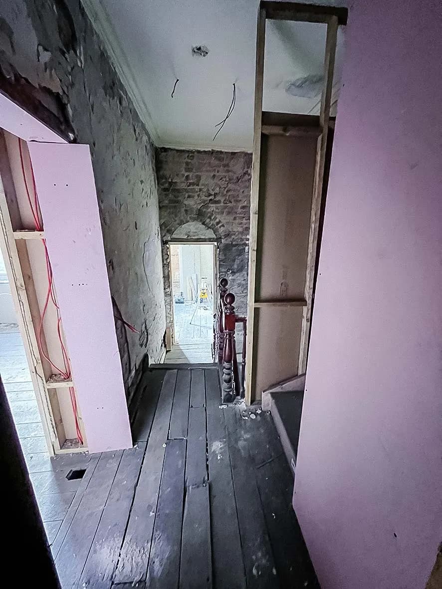 Mid-build · staircase + landing