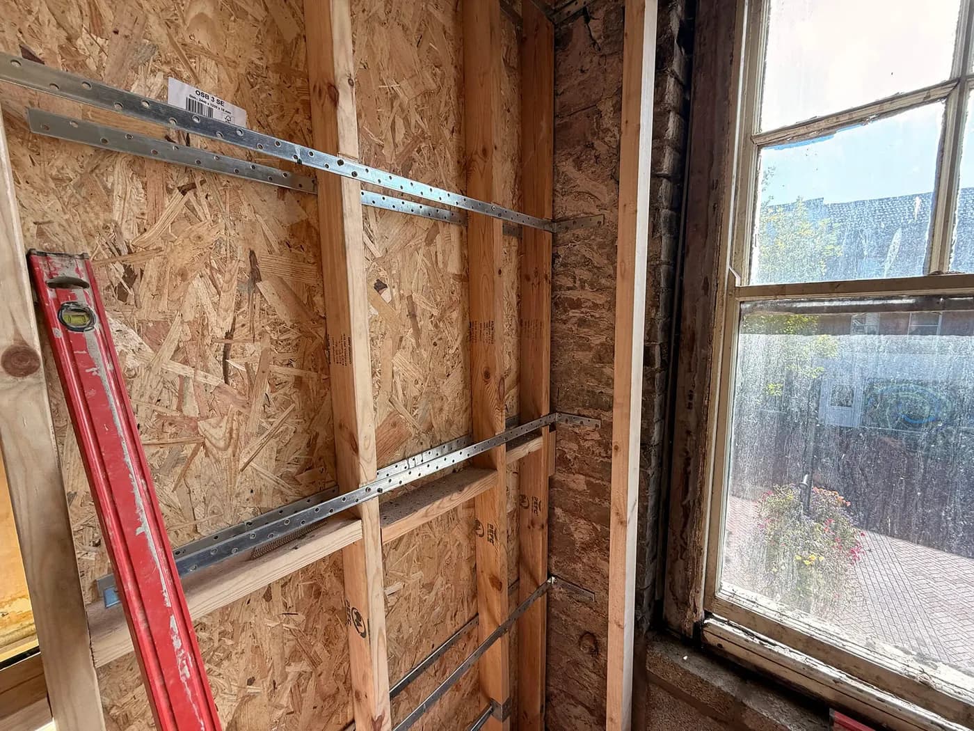Mid-build · window detail