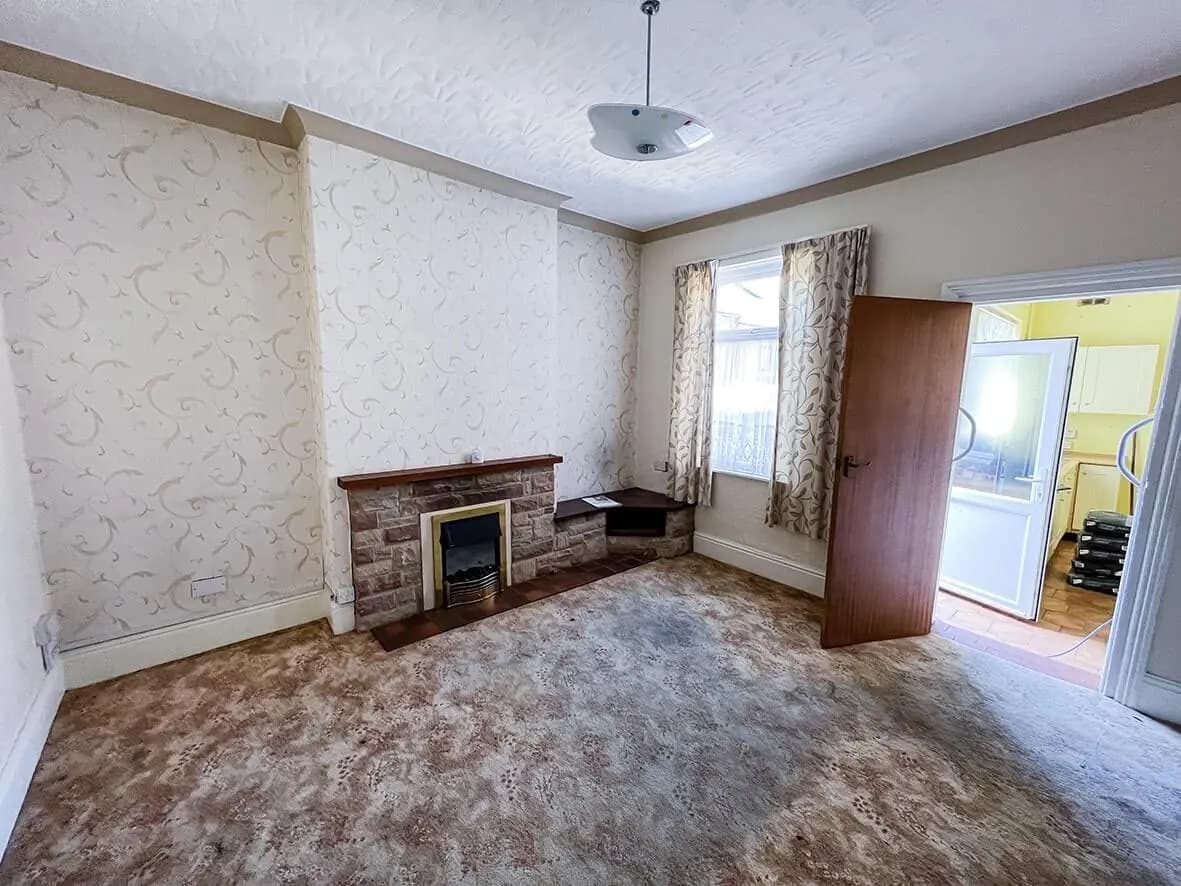 Before · dated kitchen with toilet