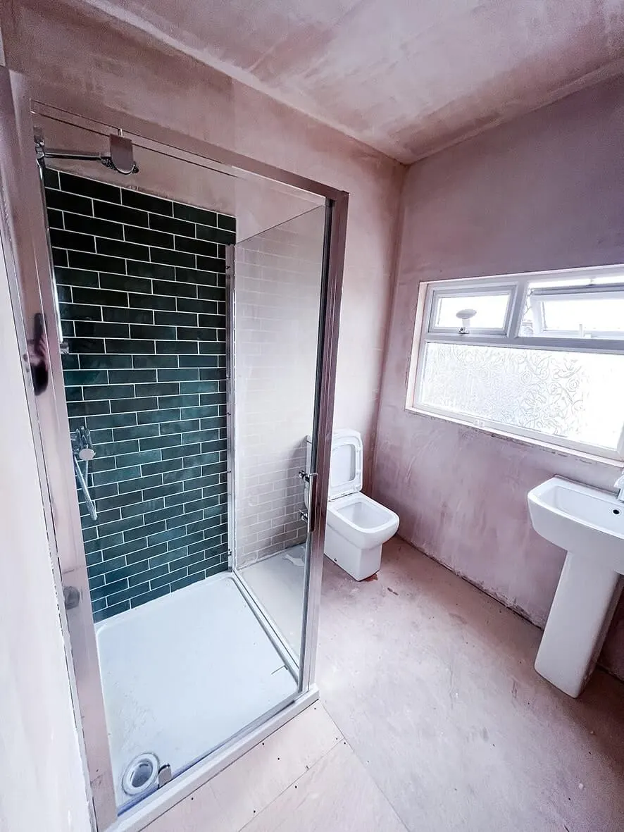 Mid-build · stud walls dividing bedrooms